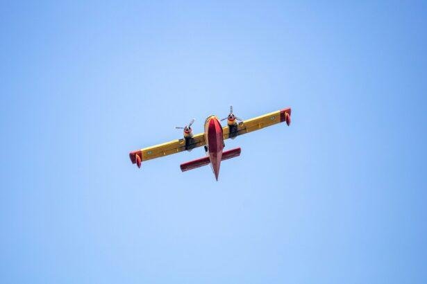 Canadair flight, Firefight Aircraft, scooper flying on blue sky, under view.