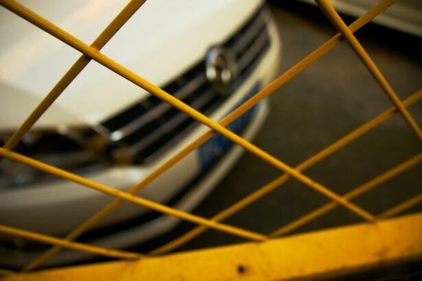 a close up of a car behind a fence